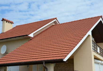 5-Inch vs 6-Inch Gutters for Stone Coated Roofing